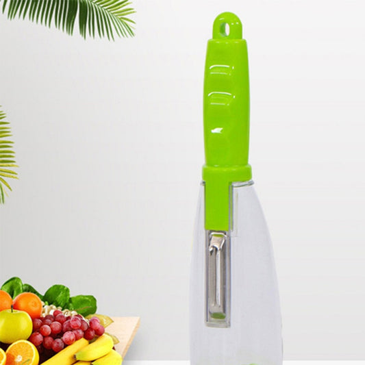 Green and white vegetable peeler with fruits and vegetables on a white background