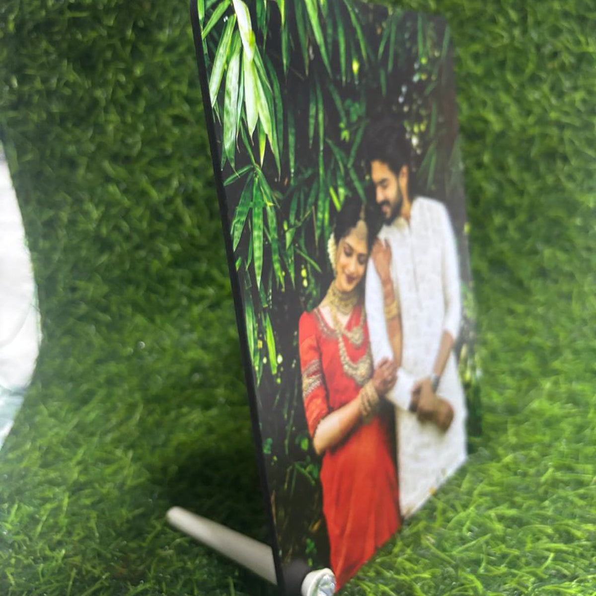 Side view of the A5 MDF photo stand showing the angled kickstand